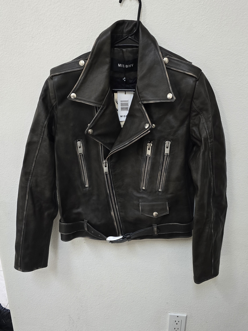Stylish MISBHV black leather biker jacket.
